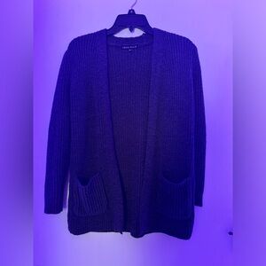 This is a love Ellie medium grey cardigan that’s is in newer condition.